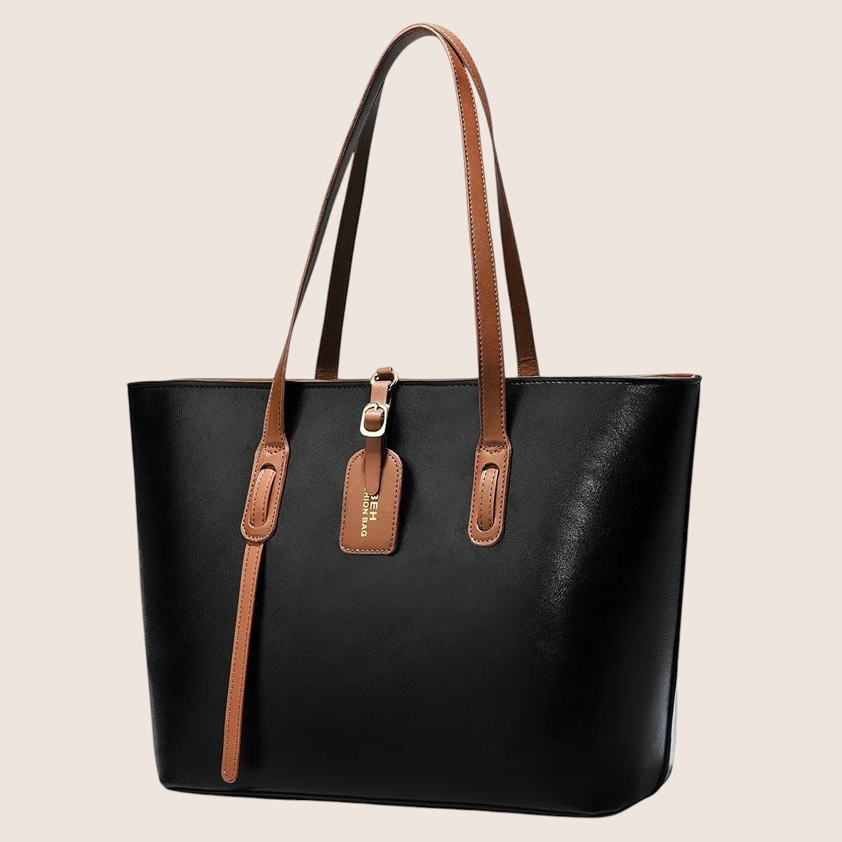 Norielle black PU leather shoulder bag with brown trim and dual handles, featuring a bucket shape and decorative tag.